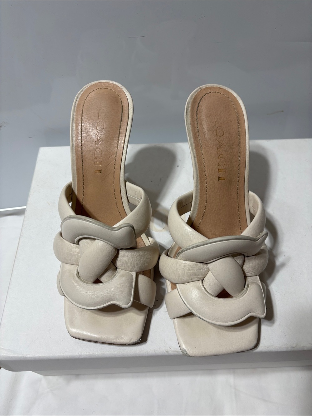 Coach Cream Knotted Leather Slide Mules. Preowned and in good condition